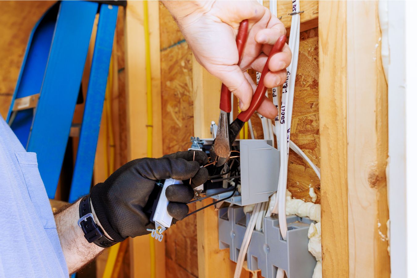 Professional electrician performing installation in Alameda, CA