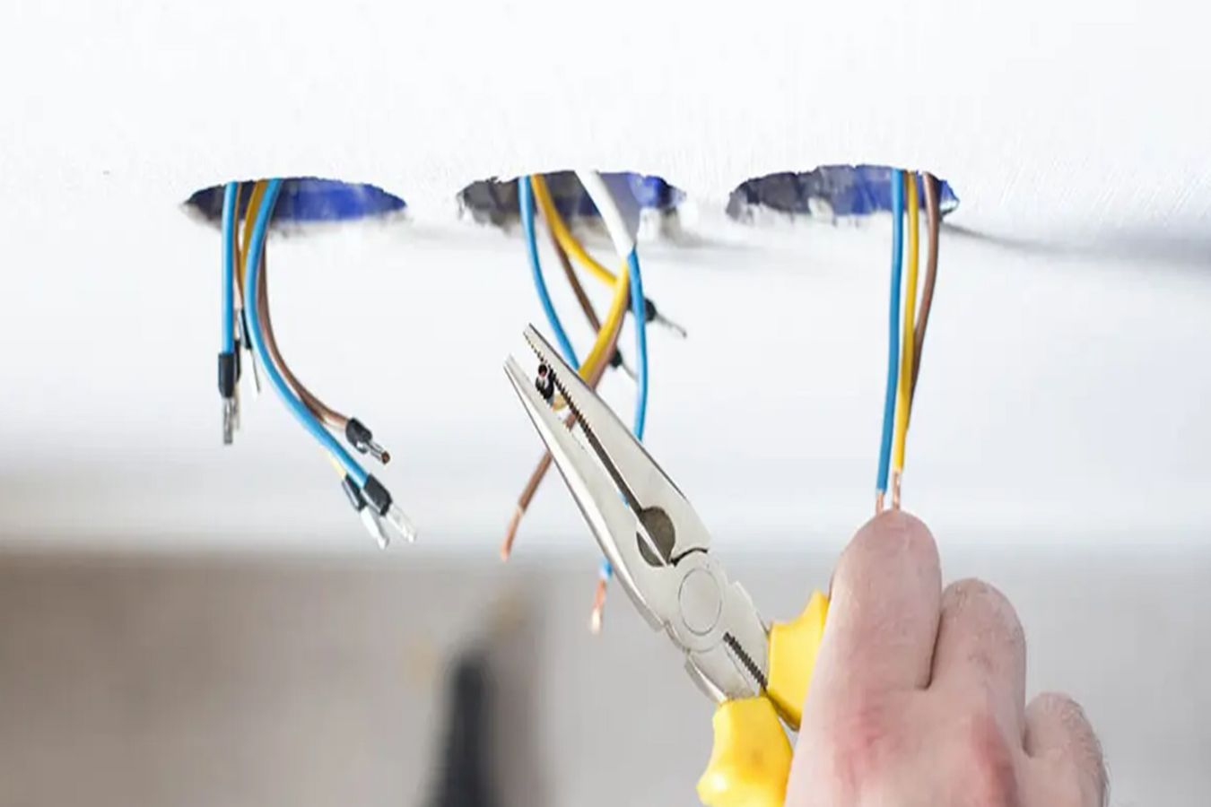 Electrician installing wiring in Alameda, CA